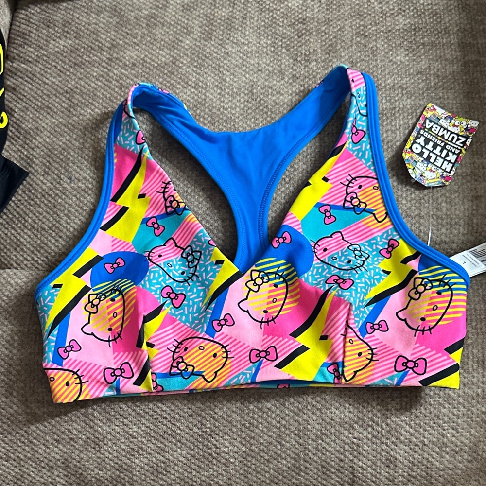 Zumba Fitness Multicolor Hello Kitty Sports Bra - Blue, Pink, Yellow